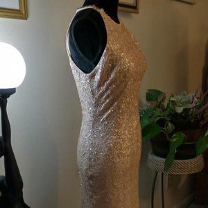 Beautiful lite pink Ladies hand sewn sequin mini dress.